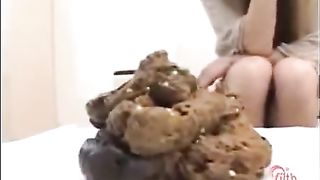 Eating her own shit