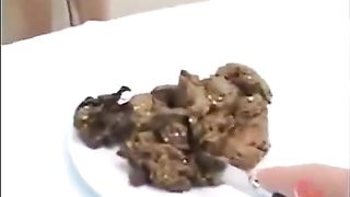 Eating her own shit