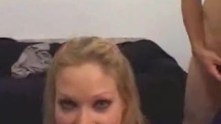 Two guys peeing on a blonde slut