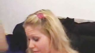 Two guys peeing on a blonde slut