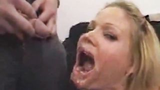 Two guys peeing on a blonde slut