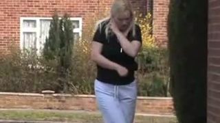 Blonde babe peeing outdoor