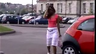 Asian girl peeing in the streets