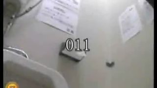 Amateur girl pooping in a public bathroom