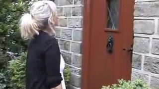 Girl in white dress peeing outdoor