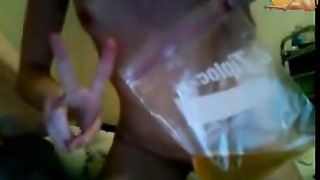 Skinny girl peeing on bedroom floor