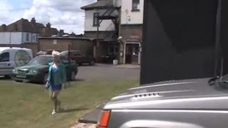 Short haired blonde girl peeing