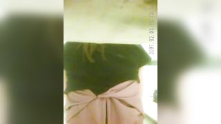 Spying on a hot milf that's pooping