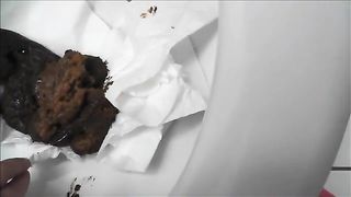 Pierced girl pooping in toilet