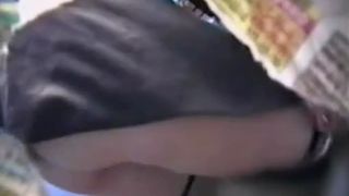 Hot babe peeing in public bathroom