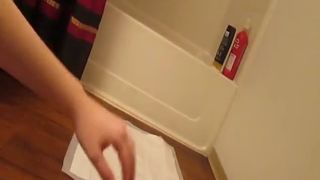 Fingering her pussy while pooping on bathroom floor