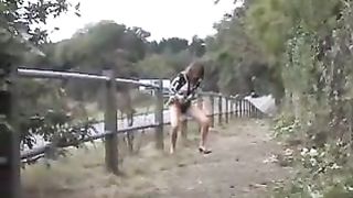 Busty brunette milf peeing outdoor