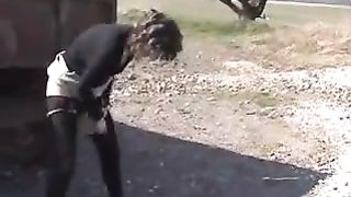 Sexy babe peeing at her farm