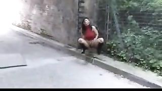 Busty Spanish girl peeing