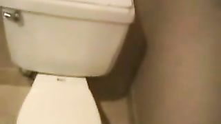 Fat wife peeing in toilet