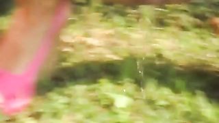 Hot milf peeing on grass