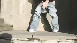 Blonde peeing on neighbours doorstep