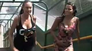 Two sluts peeing in public