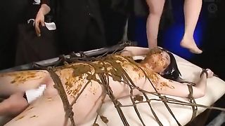 Smearing poop on a cute bondaged teen