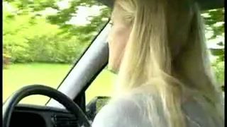 Blonde babe peeing from moving car