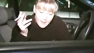 Smoking while peeing from car