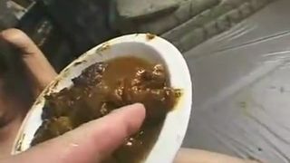 Forced to eat poop with a spoon