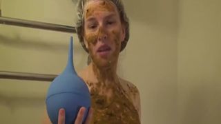 Smearing shit on her sexy body