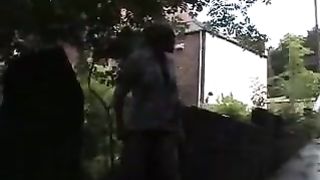 Blonde girl peeing outdoor