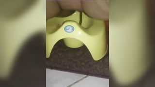 Fat wife shitting in green potty