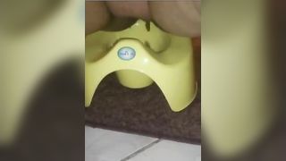 Fat wife shitting in green potty