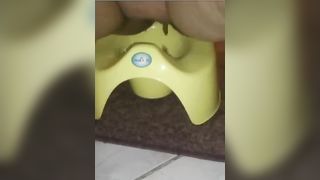 Fat wife shitting in green potty