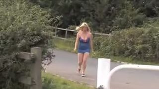 Girl with big boobs peeing on grass