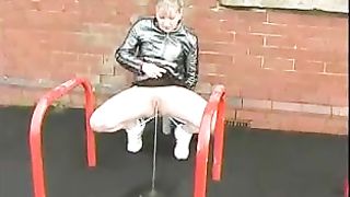 Blonde babe peeing outdoor slowly