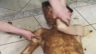 Covered her entire body with fresh shit