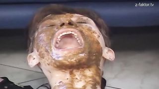 Covered her entire body with fresh shit