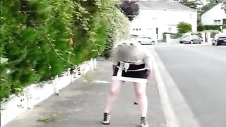 Mature woman pooping in the streets