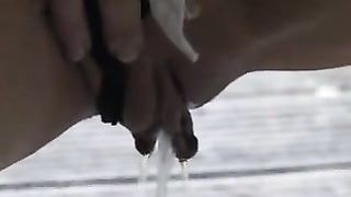 Beautiful blonde with big clitoris peeing