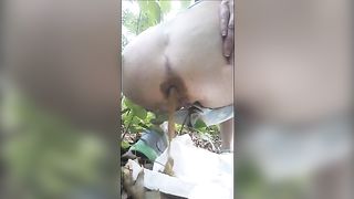 Playing with her ass while pooping