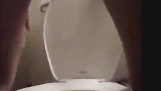 Playing with her ass while pooping slowly