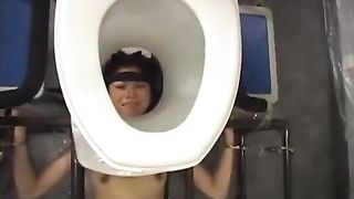 Two guys shitting on a female slave