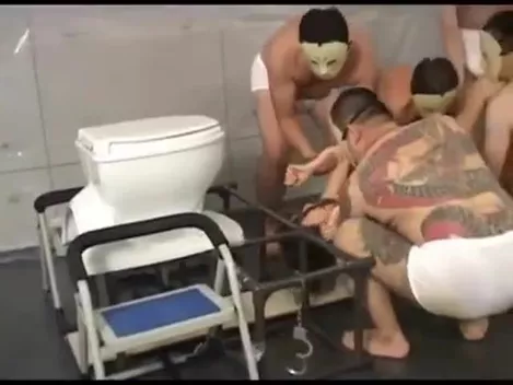 Two guys shitting on a female slave