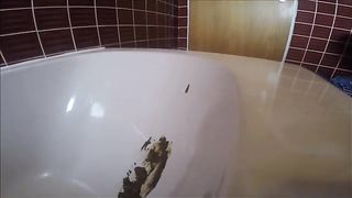 Bubble butt teen shitting in bathtub