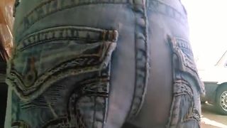 Tattooed girl shitting in tight jeans