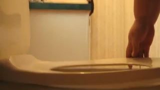 Fat granny pooping in toilet