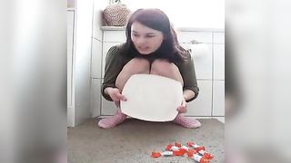 Pierced girl shitting on a plate