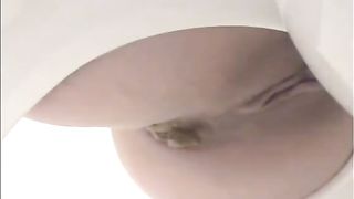 Amateur babe shitting on homemade toilet