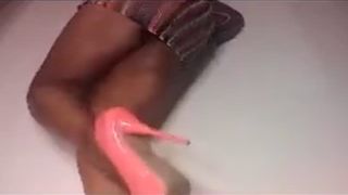 Ebony girl shitting in fishnet