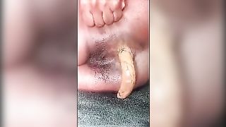 Yellow turd from black ass