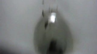 Two girls shitting by turn slowly