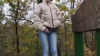 Hot brunette peeing in nature